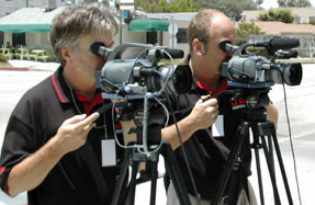JVC representatives Matt Barrett and Doug Mullin filming the event .